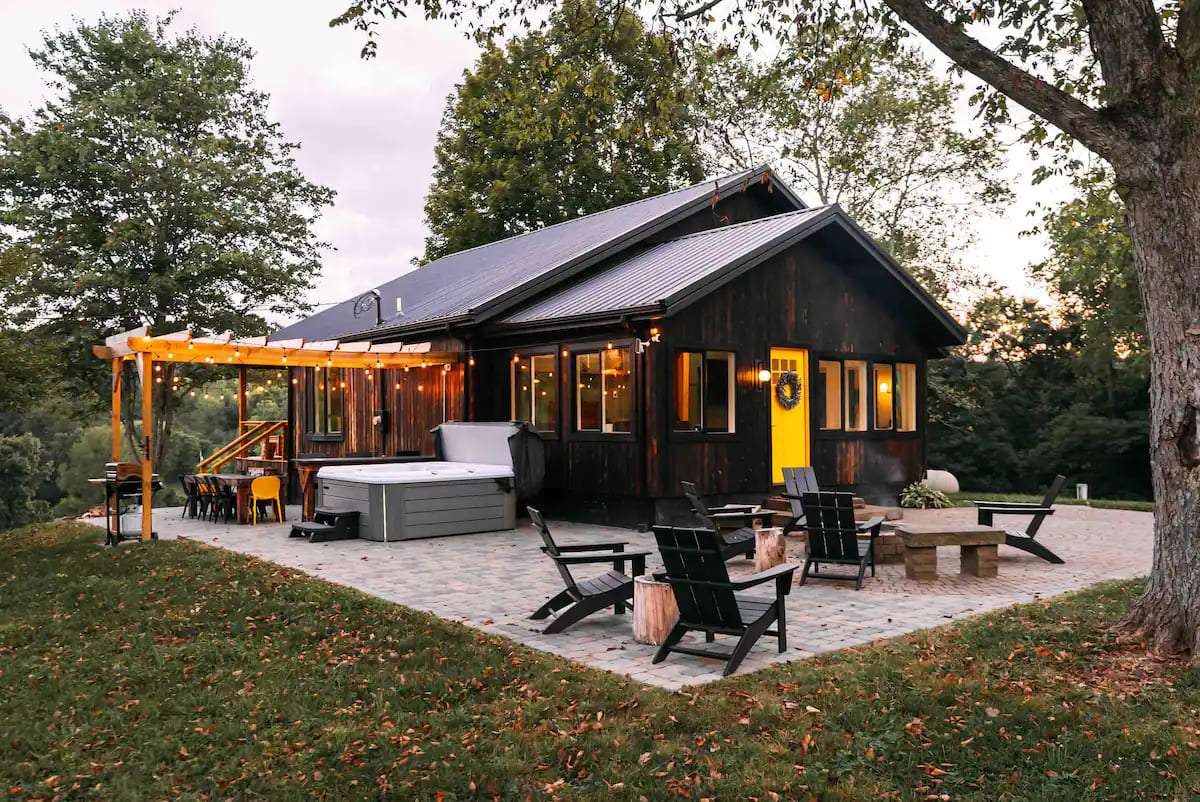 Tiny Cabin Surrounded by Fields of Wildflowers - Dream Tiny Living